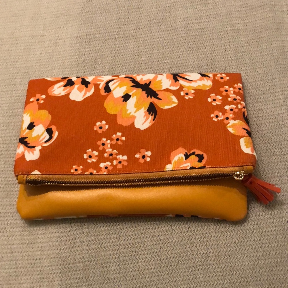 Floral reversible clutch